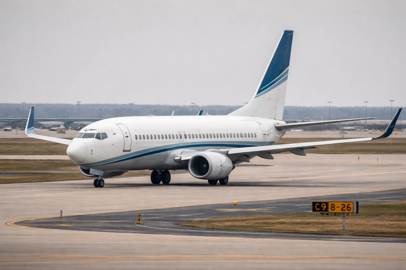 Boeing 737-700 Passenger Aircraft Boeing 737-700 passenger aircraft taxiing at a major airport