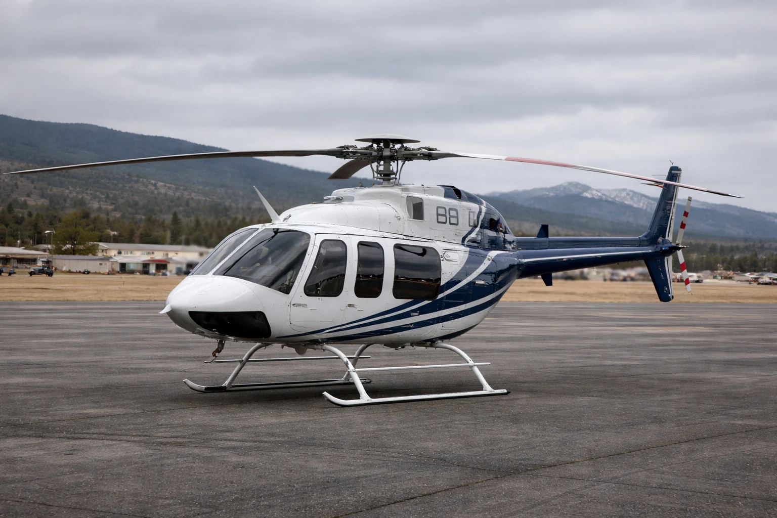 Bell 407 Helicopter on Airport Ramp Bell 407 helicopter on an airport ramp in northern Arizona